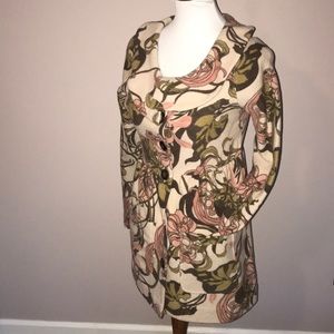 Sweater with retro pink and green floral pattern